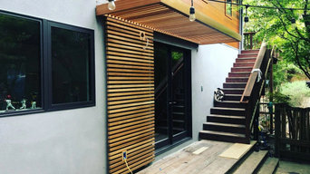 Entry wooden awning and wooden paneling