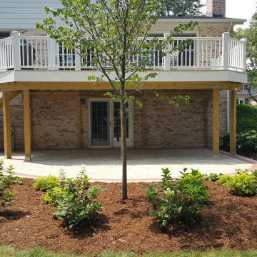 Palatine Unilock paver patio, gas fire pit, seat wall, landscape