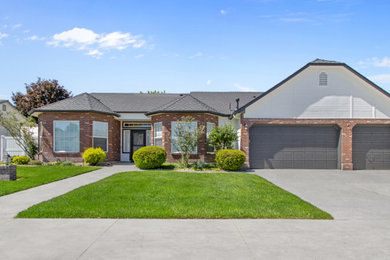 Example of a transitional exterior home design in Boise