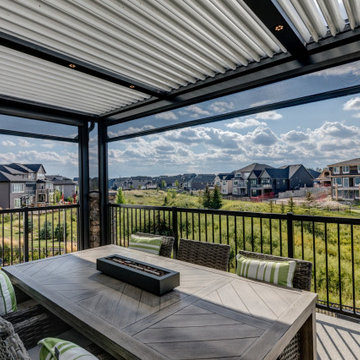 Enclosed StruXure Pergola and Lower Walkout with Phantom Motorized Screens