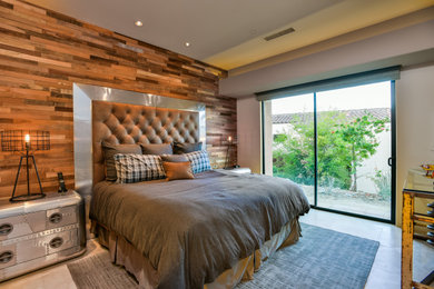 Inspiration for a mid-sized country master bedroom in Montreal with grey walls, grey floor and wood walls.