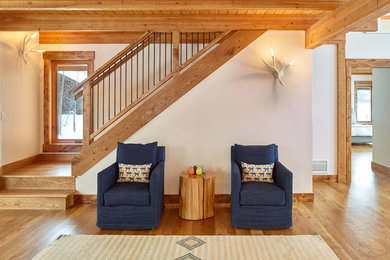 Foyer - mid-sized transitional dark wood floor foyer idea in New Orleans with white walls