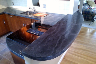Kitchen - kitchen idea in Baltimore with concrete countertops