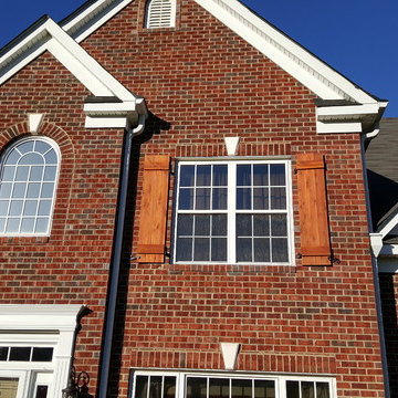 Exterior Shutters and Wall-Mounted Pergola