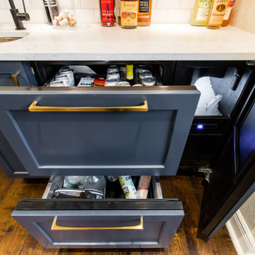 Wet Bar Blue Cabinets with pull out refrigerator storage