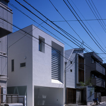 新宿の長屋／光庭と小さな吹抜けでつなぐ二世帯住宅