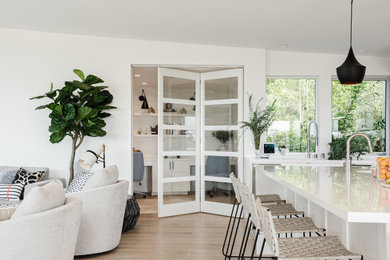 Example of a large beach style home design design in Los Angeles