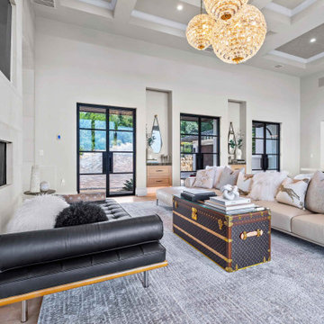 Living Room with Chandelier and Glass Double Doors