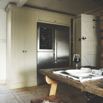 Rustic green kitchen with open plan shelving