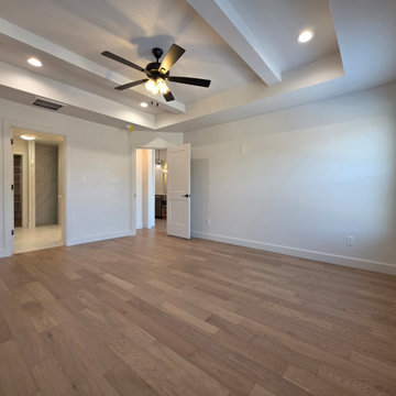 Primary/Master bedroom opens to Primary/Master Bathroom
