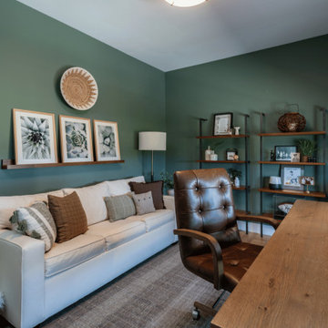 Transitional Forest Green Home Office with Picture Ledge & Open Shelving