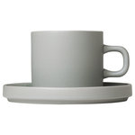 blomus - Pilar Coffee Cups With Saucers, Set of 2, Mirage Gray - Coffee Cups with Saucers are functional for every occasion. Make the coffee twice as tasty with this set of 2. The PILAR coffee cup and saucer has what it takes to become a favorite accessory for coffee lovers. Beautifully shaped yet humble enough to act as a discreet backdrop to the perfectly arranged meal. The new PILAR tableware collection was designed by Floz Design in Germany. Stoneware pieces include bowls, plates, mugs and serve ware. The full range comes in three matching colors: moonbeam, agave green and mirage gray. Start setting the table with your own unique color combinations. Outside of stoneware is matte. Inside serving area is glazed for design compliment and easy cleaning. PILAR stoneware is manufactured from clay, quartz and minerals such as calcite and is defined as a ceramic product. The stoneware is molded at very high temperatures using casting techniques. The high temperatures during the firing process make stoneware more stable than clay and less translucent than porcelain. Due to the heating and glazing processes of stoneware, these pieces may have slightly different attributes which can add to their beauty and uniqueness.