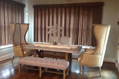 Enclosed dining room - mid-sized traditional medium tone wood floor enclosed dining room idea in Birmingham with beige walls and no fireplace