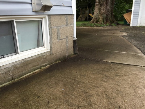 Sloped Concrete Next To Foundation, Water Leaking Into Basement From Driveway