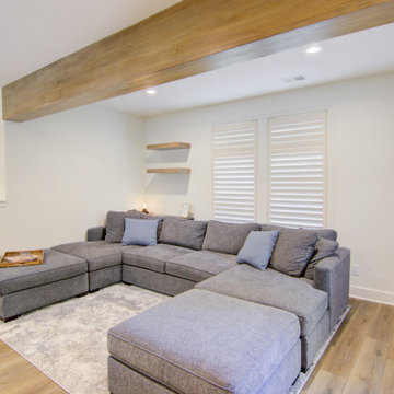 Warm & Inviting Basement Retreat with Kitchenette and Reading Nook