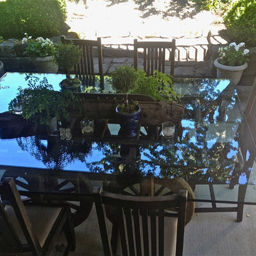 USED AN ASIAN OX CART FOR TABLE BASE