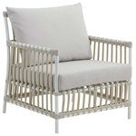 Sika Design - Caroline Exterior Lounge Chair, Dove White, Sunbrella Sailcloth Seagull Seat and Back Cushions - The Caroline Outdoor Lounge Chair by Sika Design combines refined sophistication with enduring function. Inspired by old design sketches, the lounge chair showcases a slat back, arms, and front apron for an airy look. Paralleling the look of natural rattan cane, the design features a maintenance-free Alu-Rattan aluminum frame with hardwearing ArtFibre, polyethylene wicker slats, and bindings. A plush seat cushion and back pillow make this a cozy spot for outdoor lounging. Combine it with other Caroline Exterior pieces for an elegant seating group that is ready for any weather and every occasion.