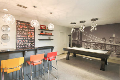 Inspiration for a mid-sized contemporary walk-out concrete floor basement remodel in Calgary with gray walls