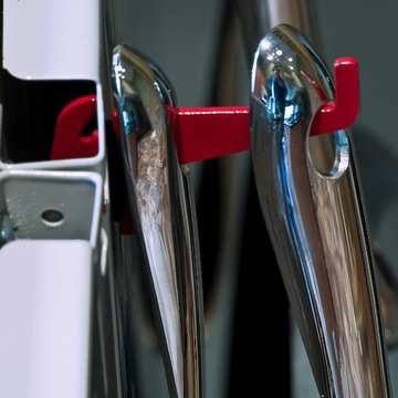 Close up of Wall Control pegboard hooks holding pots and pans | Kitchen Pegboard