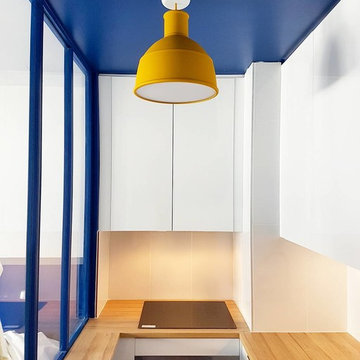 Ouverture d'une cuisine avec une verrière sur mesure en bois à Pigalle