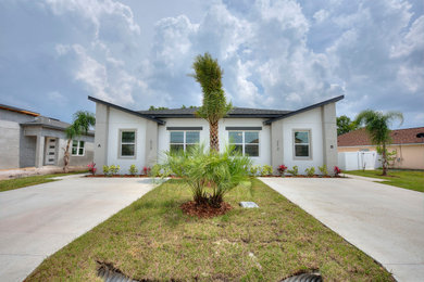 Example of a minimalist exterior home design in Other