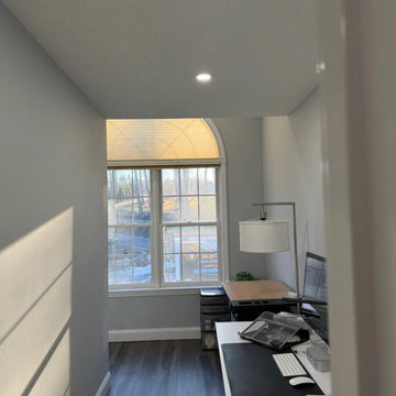 Recessed lights added to a home office without disturbing the textured ceiling