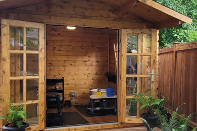 Small elegant detached studio / workshop shed photo in Seattle