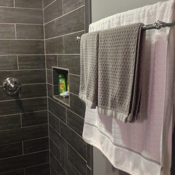 Contemporary ceramic wood looking tile shower