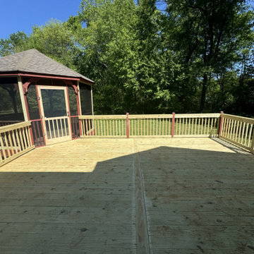 Pressure-Treated Wood Deck with Gate Access and Gazebo Connection
