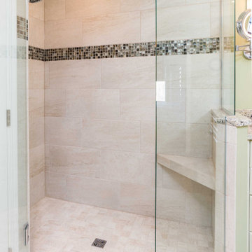 Traditional Primary Bath With a White Vanity Tower and Curbless Shower