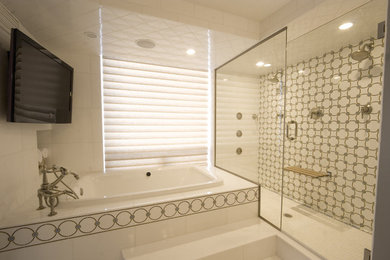 Inspiration for a large contemporary master gray tile and marble tile marble floor and white floor bathroom remodel in Chicago with flat-panel cabinets, dark wood cabinets, a one-piece toilet, gray walls, a drop-in sink, quartzite countertops, a hinged shower door and white countertops