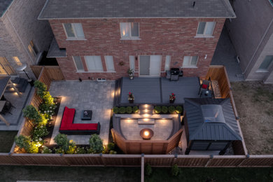 Example of an arts and crafts deck design in Toronto