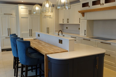 This is an example of a farmhouse kitchen in Cambridgeshire.