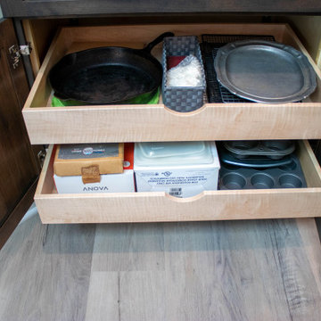 3 Finishes on Kitchen Cabinetry with Galley Workstation in Island and Wine Bar