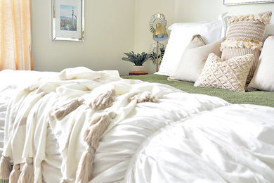 Example of a small trendy master carpeted bedroom design in Phoenix with gray walls and no fireplace