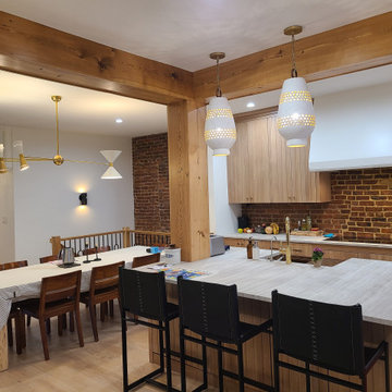 Rustic Modern Kitchen Renovation with Exposed Brick and Warm Wood Accents