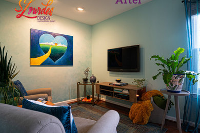 Family room library - small modern open concept light wood floor and multicolored floor family room library idea in DC Metro with blue walls and a tv stand