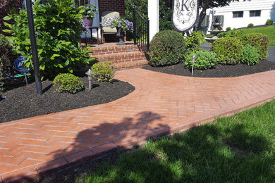This is an example of a traditional front yard landscaping in DC Metro.