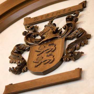 Carved wood family crest