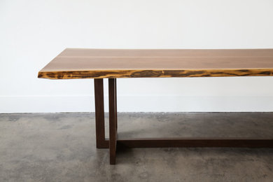 Example of a small minimalist concrete floor and gray floor dining room design in Atlanta with white walls