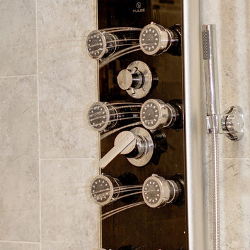 Elegant Master Bathroom Remodel with Quartz-Granite Hybrid Vanity and Spa Shower
