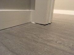 New Construction Gaps Between Floor And Baseboards