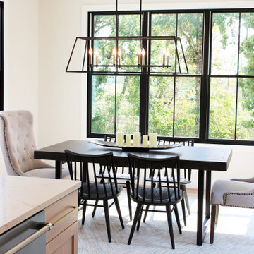 Oak, and White Kitchen with Matte Black Accents in Iowa Aspen Homes Farmhouse