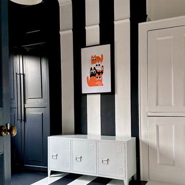 Farrow and Ball maximalist and eclectic hallway