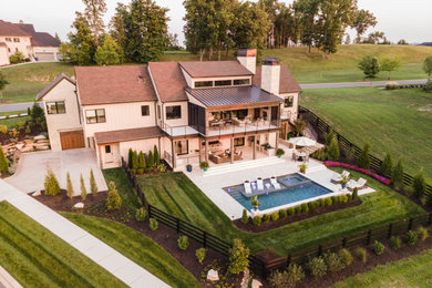 Example of a transitional exterior home design in Nashville