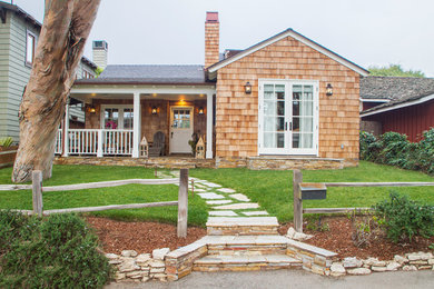 Small traditional one-story wood exterior home idea in Los Angeles