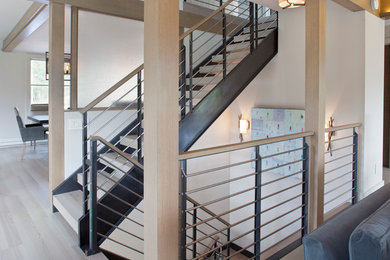 Staircase - large rustic wooden floating open staircase idea in Denver