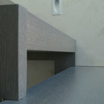 Modern metal stair covered by patina oak
