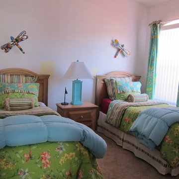 Bright, colorful twin bed guestroom