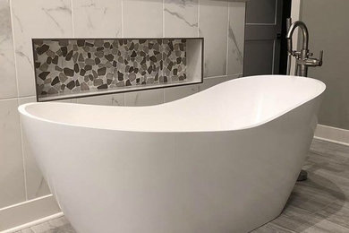 Master bathroom with a slip bathtub